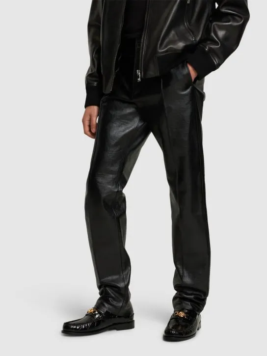 Versace   Medusa croc embossed leather loafers 